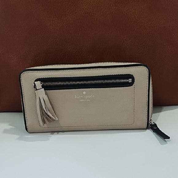 kate spade Handbags - kate spade beige and black leather zip wallet